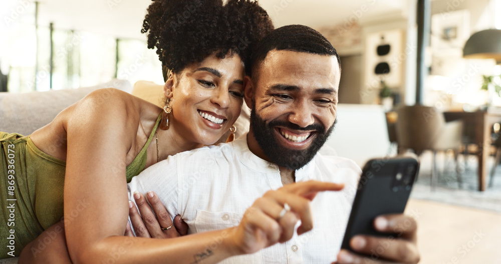 Poster couple, phone and couch with social media, streaming and smile together in home with app. online sho