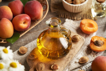 Apricot kernel oil in a glass jug - healthy natural food