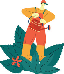 Gardener watering plants in garden