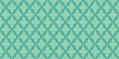 A patterned green background with a blue and white design