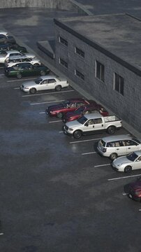 A bustling parking lot filled with a multitude of parked cars.