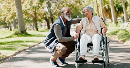 Senior, man and woman with disability in park for fresh air, walking and enjoyment of retirement or...