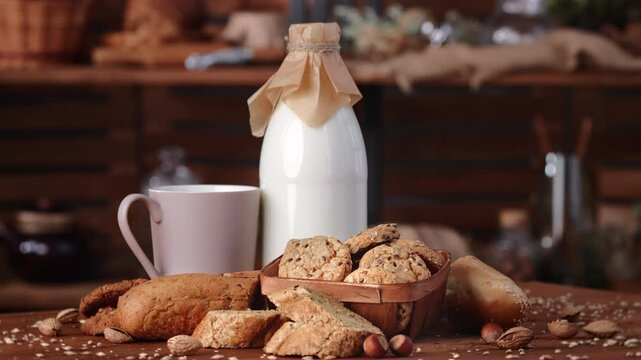 Natural organic food for breakfast in countryside house, fresh milk, multigrain bread and cookies