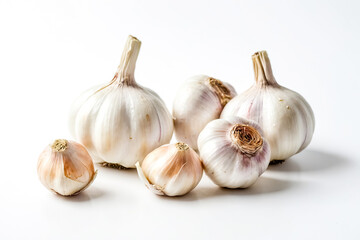 Fototapeta premium Closeup of Garlic Bulbs on White Background