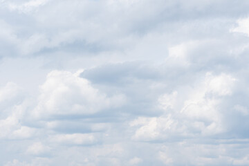 Dense gray thunderstorm cumulus wavy clouds in the whole frame. Gloomy rainy Sky background to overlay on your photos