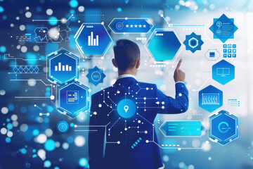 A man pointing at a blue and white diagram with many circles and lines