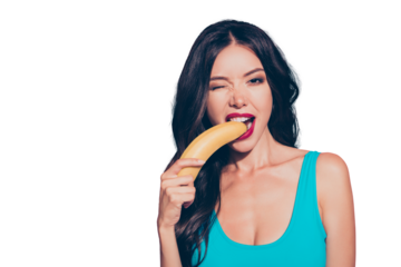 Close-up portrait of nice cheerful cheery childish playful girlish funny crazy attractive charming wavy-haired lady red lips biting banana white teeth isolated on pink pastel background