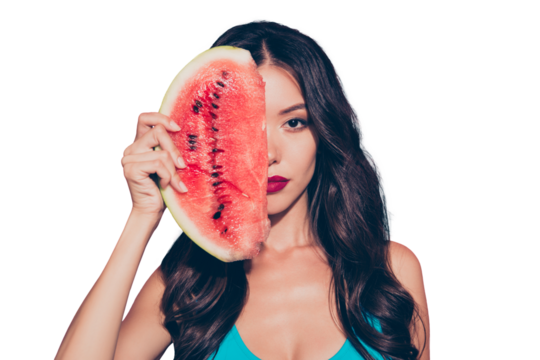 Close-up portrait of calm confident attractive wavy-haired lady red lips holding melon slice hiding closing covering half face behind isolated on pink pastel background