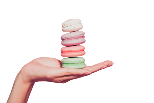 Close-up cropped photo of female feminine thin palm holding showing sugary dessert bakery colorful snack isolated on pink pastel background