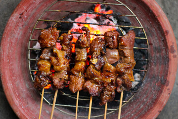 Sate Kambing or Goat Satay, made from goat meat grilled with savory spices and soy sauce.
