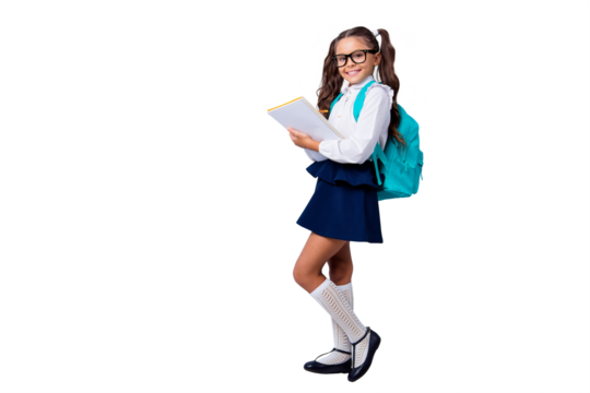 Full size body length of nice smart cute cheerful stylish adorable small little girl with curly pigtails in white blouse shirt and blue skirt, writing stories in book. Isolated over grey background