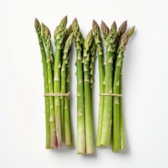 Two bundles of fresh green asparagus stalks, tied with string and arranged on a white background.
