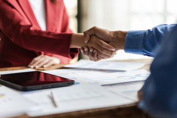 Handshake, Business cooperation at a meeting of business people. Business partners shaking hands in a meeting.