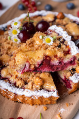 Freshly Baked Cherry Crumble Pie, Berry Pie over Summer Background