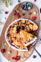 Freshly Baked Cherry Crumble Pie, Berry Pie over Summer Background