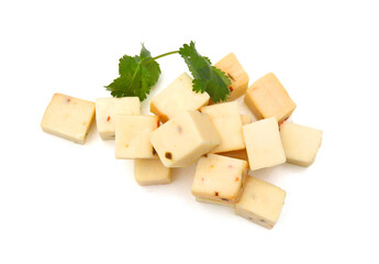 Cubes of cheddar cheese isolated on white