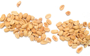 Dried peanuts in closeup on white