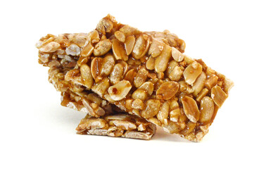 Honey bars with peanuts, sesame and sunflower seeds isolated