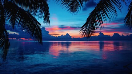 tropical sunset over calm ocean with silhouetted palm trees, beach getaway, exotic vacation