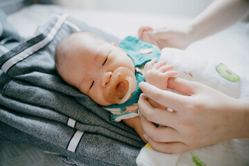 1-month-old Asian newborn girl