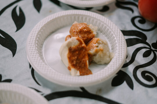 Siomay, a traditional Chinese dish adapted into local Sundanese cuisine in Indonesia, featuring steamed dumplings with various fillings.