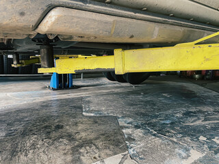 The elevator is lifting cars for maintenance.
