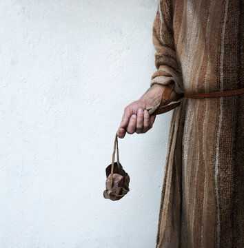 Man's hand with an old sling