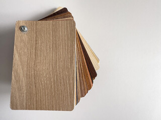  wooden vinyl samples of laminate or parquet close up