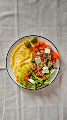 continental breakfast, omelet, vegetables and toast, no people, top view