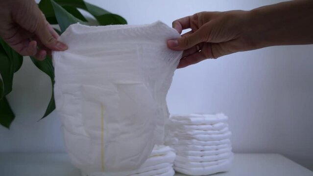 Diaper Demonstration. Diaper panties for babies