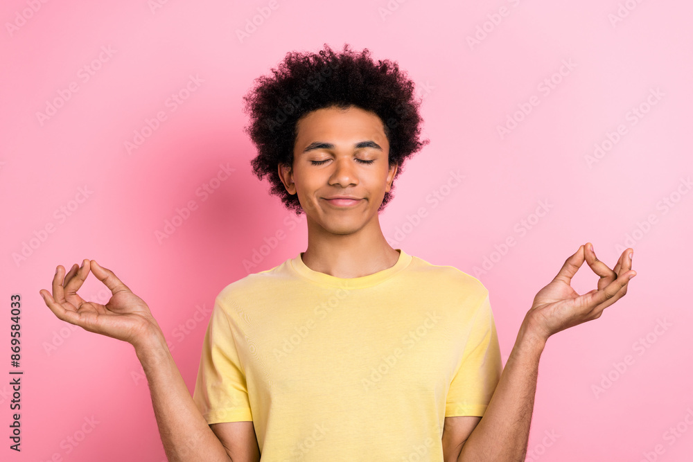 Sticker portrait of calm positive man closed eyes hands fingers meditate isolated on pink color background