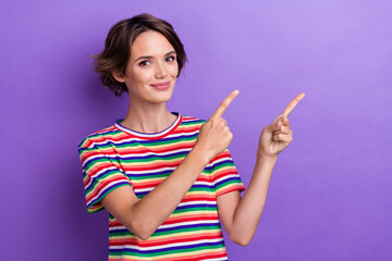 Photo portrait of attractive promoter lady directing fingers empty space huge sales season isolated...