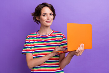 Photo of pretty positive girl hold use wireless laptop coworking isolated on violet color background