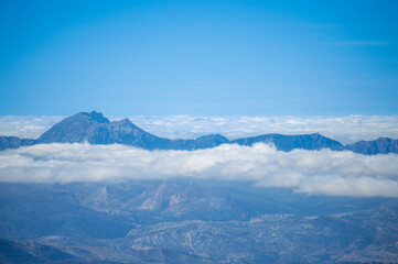 Fototapeta premium Panoramic view from the hiking trail to Torrecilla peak, Sierra de las Nieves national park, Andalusia, Spain