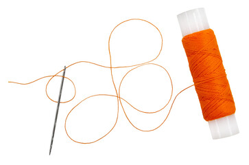 Old spool of thread and needle on a white background. Sewing accessories
