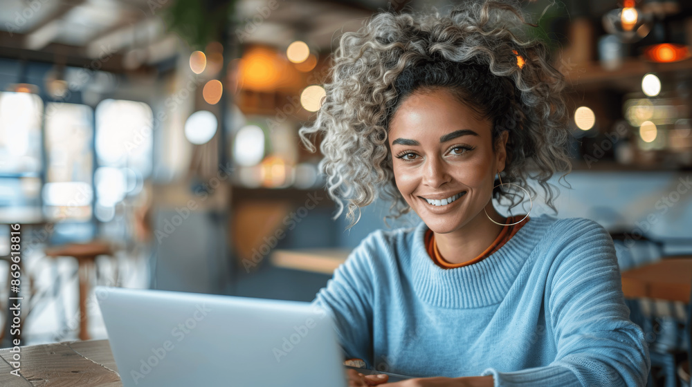 Poster Smiling young woman working on laptop at modern cafe table, AI generated freelancer or student portrait