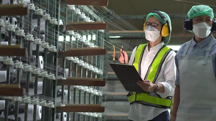 Professional engineer women, worker, mechanical, maintenance, engineering women training. Engineer woman worker work design program machine in Textile factory. industry.
