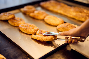 Close-up photo of a freshly baked pastry with cheese.