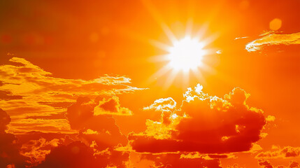Heat stroke - Concept for climate change, heat wave or global warming, orange sky with clouds and bright sun