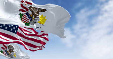Illinois state flags waving with the national flag of the American flags