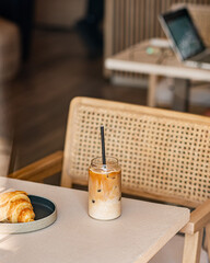 Iced coffee drink on the coffee shop table. Cold drink.