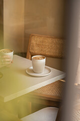 Cappuccino on a coffee shop table. Gourmet coffee.