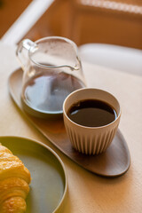 Glass jar with coffee, on the coffee shop table. Coffee concept. Gourmet coffee.