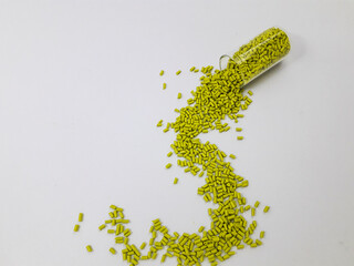 margarita green masterbatch granules on white background,color pigment carrier polymer in plastic...