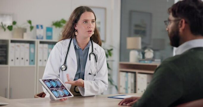 Doctor, screen and tablet with patient, brain scan and diagnosis for healthcare results at hospital. Neurologist, man and technology with MRI or x ray at neurology clinic for medical consulting