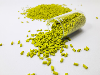 margarita green masterbatch granules on white background,color pigment carrier polymer in plastic...