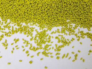 margarita green masterbatch granules on white background,color pigment carrier polymer in plastic...