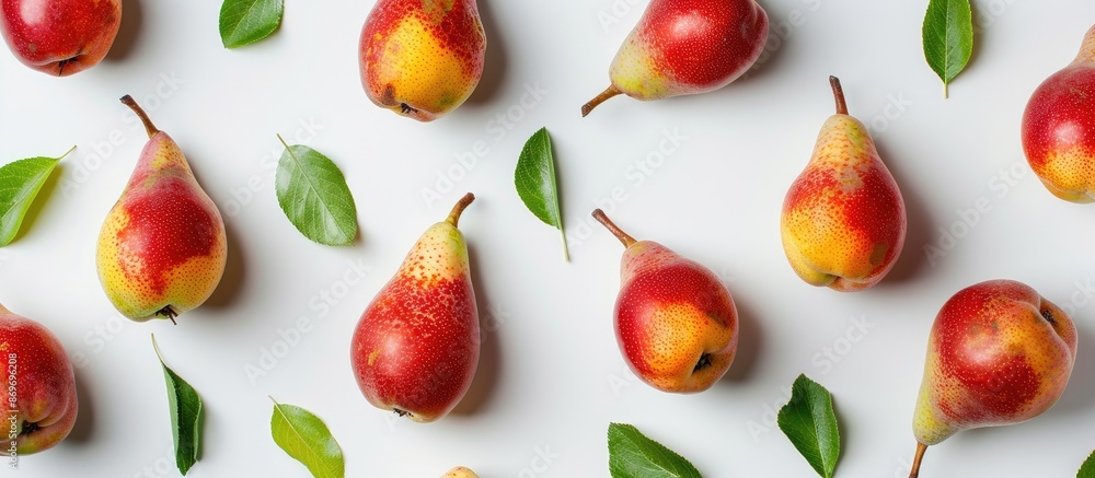 Poster ripe red and yellow pears with leaves isolated on a white background, providing copy space in a top-