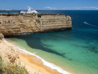 Chapel Nossa Senhora da Rocha overlooking the Atlantic Ocean in Portugal