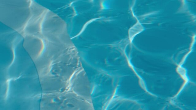 Summer pool water surface close up